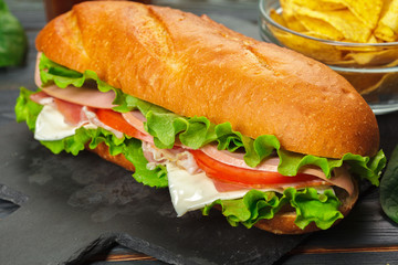 sandwich on a wooden table