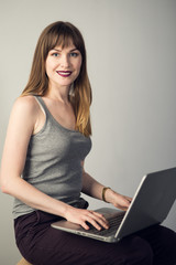 Businesswoman on a gray background