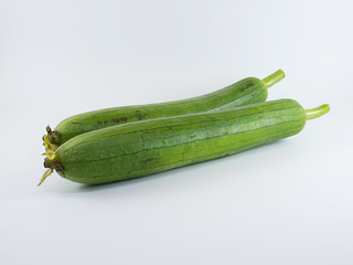 Fresh zucchini isolated on a white background.