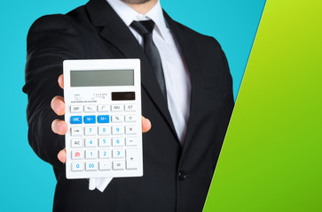 Unrecognizable businessman showing you a calculator. Business concept