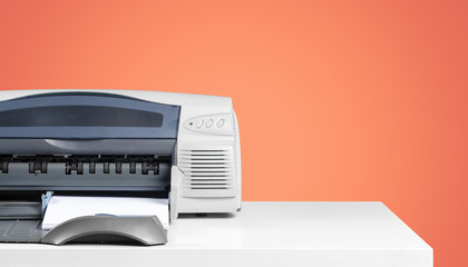 Fototapeta premium Printer copier machine on a bright colored background