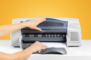 Printer copier machine on a bright colored background
