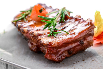 Grilled Barbecued Pork Baby Back Ribs, close up