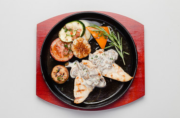 fried chiken with vegetables and sauce