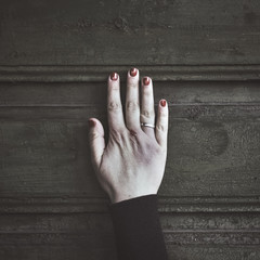 Woman's arm with bruise and blood after fight