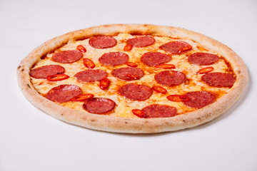 Pizza pepperoni isolated on white