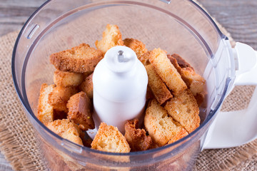 Dried bread in a blender