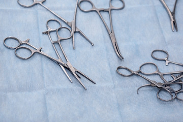 Surgical tools lying on table
