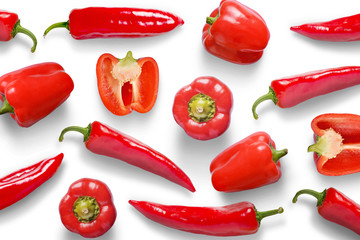 Scattered red peppers on a white background