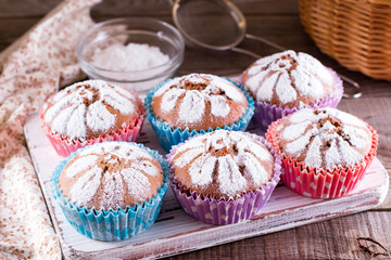 Chocolate cup cakes with powdered sugar