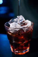 bartender prepares a cocktail