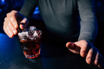 bartender prepares a cocktail