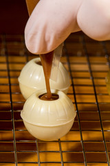 Filling white chocolate truffles