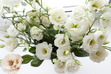  bouquet of white flowers in a vase. Eustoma	