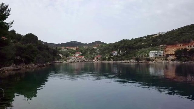 Filming small beautiful blue green bay lagoon in slow motion hd. Filmed while sailing in Croatia on islan Dugi otok behind village Sali at beautiful blue Adriatic sea.