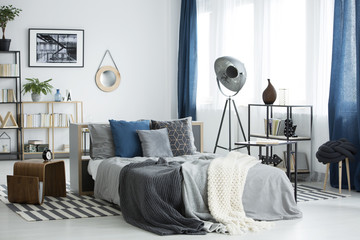 Grey cozy bedroom interior