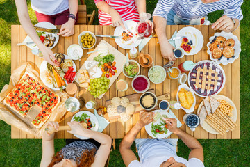 Young people eating outside