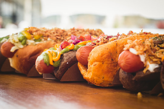 Plenty of various served hot dogs