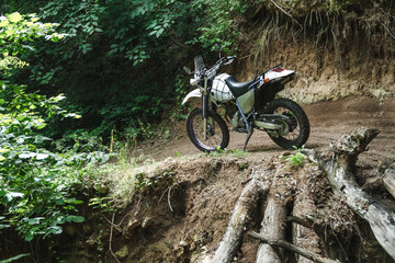 Fototapeta na wymiar travel motorcycle off road, forest dirt, concept, active lifestyle, enduro