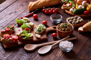Breakfast still life with sandwiches, quail eggs, spicies and fresh fruits and vegetables, selective focus