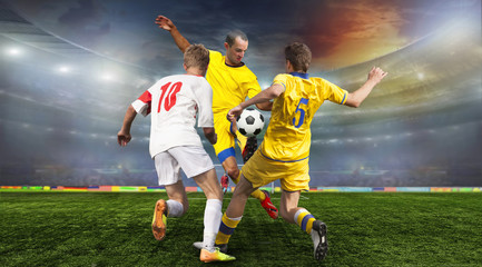 Obraz na płótnie Canvas Soccer ball on the field of stadium