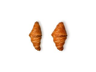 Fresh croissant isolated on white background, top view. Home made bakery pastry set.