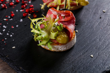 Salami canape with cucumber