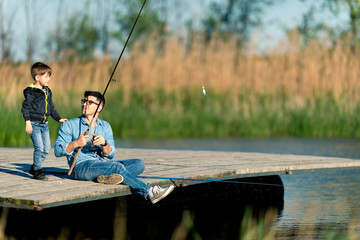 Teaching my son how to fish