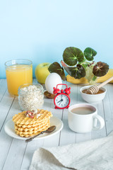 Useful Colorful Breakfast Coffee Milk Fruit Cookies Alarm Clock Oats Still Life White Table