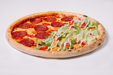 Pizza with salami and chicken isolated on white