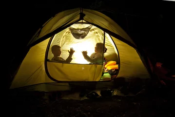 Fotobehang children in the nature near the tent © Ivan