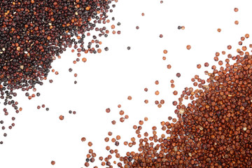 Black and red quinoa seeds isolated on white background with copy space for your text. Top view