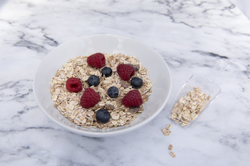 Bowl of muesli on a marble background 