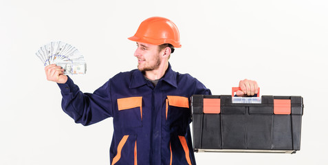Handyman with smiling face in hard hat on white background.