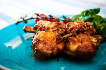 roasted sleeves chicken with potatoes and barbecue sauce