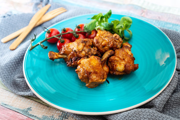 roasted sleeves chicken with potatoes and barbecue sauce