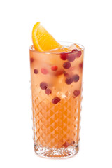 Sex on the beach cocktail with red currants decorated with orange slice