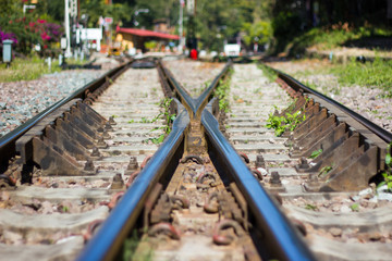 railway track, line crossing railway track on the stone background 