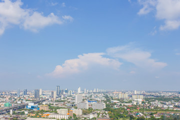 Aerial view of city, Landscape of Bangkok city skyline in Aerial view with skyscraper, modern office building and blue sky with cloudy sky background in Bangna Bangkok, Thailand.