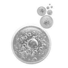 Black and white bubbles air inside a large water bubble isolated on white background. Macro.