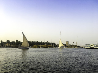 Obraz premium Scenic view of Nile River during sunset in Aswan Egypt