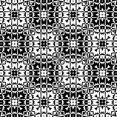 Seamless ornate  pattern in a black - white colors