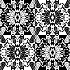 Openwork pattern with four decorative flowers in a black and white  comtrast colors