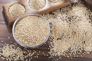 quinoa beans in bowl on rustic wooden background