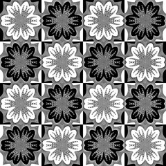 Decorative seamless pattern with a flowers in a black and white colors in a Op Art style