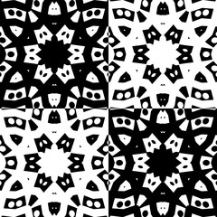 Openwork pattern with four decorative flowers in a black and white  comtrast colors