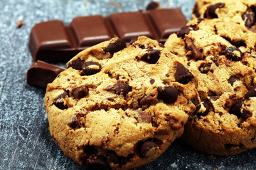 Chocolate cookies on rustic table. Chocolate chip cookies