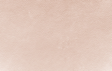 Abstract light brown texture. Ribbed fabrics leather background.