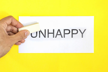 Eraser converts unhappy into happy. concept for self belief, positive attitude and motivation