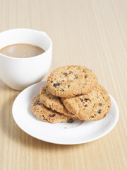 homemade chocolate chip cookies and coffee on the table